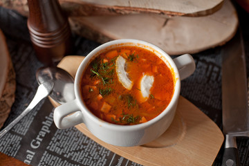 the Russian solyanka with seasonings on a table