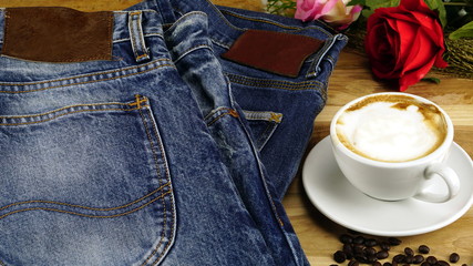 Blue jeans with leather label and red selvage. Jeans are type of garment and hard-wearing cotton...