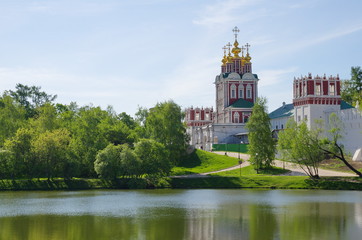 Fototapeta na wymiar Novodevichy convent in Moscow, Russia. Gate Church of the Transfiguration of the Saviour