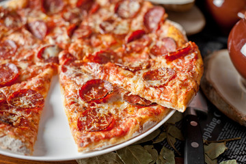 pizza with cherry tomatoes and black olives