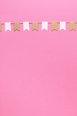 Party flags garlands set on pink background. Holiday design.