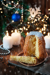 Fototapeta na wymiar Christmas cake panetone on the wooden table