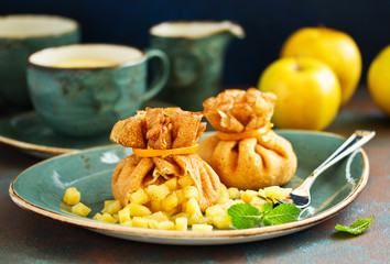 Russian pancakes stuffed with apples and caramel.