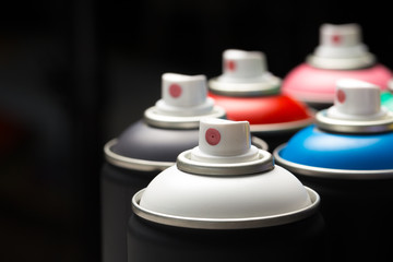 Spray paint cans close up
