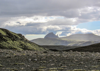 Dramatic icelandic terrain with volcanoes, canyons, glacial rivers, highland deserts and poor vegetation, on the Laugavegur Trail, Highlands of Iceland