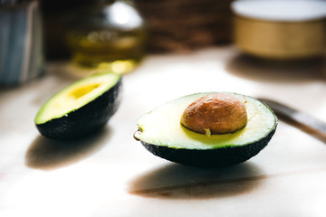 Fresh cut avocado on a cutting board