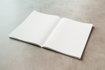 White open magazine mockup on concrete 3D rendering