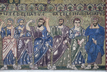 Apostles mosaic on the facade on Romanesque Basilica of San Frediano, Lucca, Tuscany, Italy 