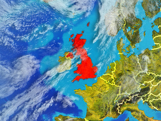 Fototapeta na wymiar United Kingdom from space on model of planet Earth with country borders. Extremely fine detail of planet surface and clouds.