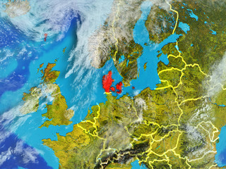 Denmark from space on model of planet Earth with country borders. Extremely fine detail of planet surface and clouds.