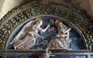 Lunette of The Annunciation, school Andrea della Robbia, Basilica of Saint Frediano, Lucca, Tuscany, Italy 