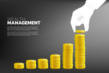 close up hand of businessman  with coin and growth graph with stack of coin. Concept of  success investment and growth in  business