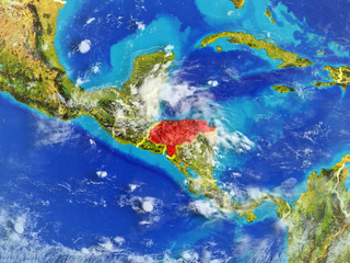 Fototapeta na wymiar Honduras from space on model of planet Earth with country borders. Extremely fine detail of planet surface and clouds.