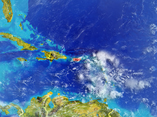 Fototapeta na wymiar Puerto Rico from space on model of planet Earth with country borders. Extremely fine detail of planet surface and clouds.