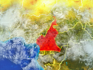 Cameroon from space on model of planet Earth with country borders. Extremely fine detail of planet surface and clouds.