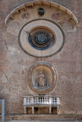 Clock tower of Palace of Reason (Palazzo della Ragione with the Torre dell'Orologio) in Mantua, Italy 