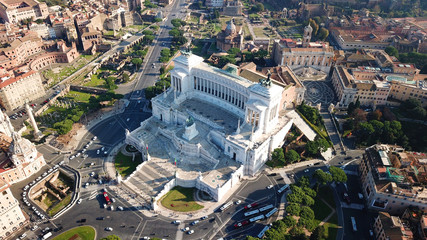Aerial drone view of iconic neoclassic building of Altar of the Fatherland - Altare della Patria, known as the national Monument to Victor Emmanuel II in city of Rome, Piazza Venezia, Italy