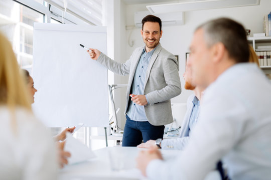 Group of business people working as team in office