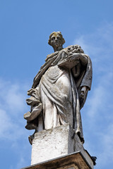 Naklejka premium Blessed Osanna Andreasi, statue on facade of the Mantua Cathedral dedicated to Saint Peter, Mantua, Italy