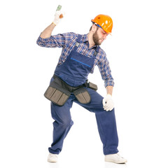 Young man builder industry worker with a hammer on white background isolation