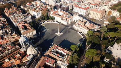 Fototapeta premium Aerial drone view of iconic Piazza del Popolo (People's Square) named after the church of Santa Maria del Popolo in the heart of Rome, Italy
