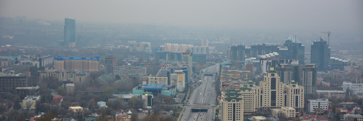 Blured view of Almaty skyline.