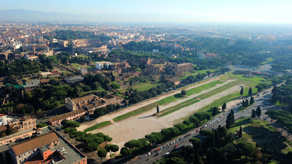 Fototapeta na wymiar Aerial drone photo of iconic Circus Maximus site of an ancient Roman chariot racing stadium and mass entertainment venue next to famous Colosseum, Rome, Italy