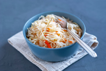 Bowl with sauerkraut standing on table