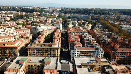 Obraz premium Aerial drone bird's eye view of iconic architecture in city of Rome next to river Tiber, Italy