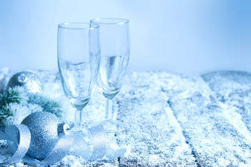 Naklejka na ściany i meble Christmas New Year's eve dinner background concept with empty glasses of champagne 