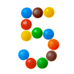 Number 5 five of sweet colored candies, alphabet isolated on white background