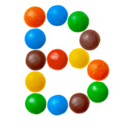 Letter B of sweet colored candies, alphabet isolated on white background