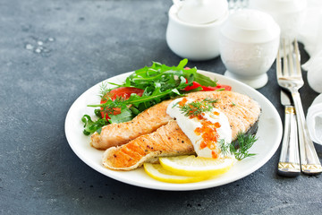 grilled salmon steak with cream sauce.
