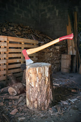 Axe on log, Vertical image of work tool used to cut wood