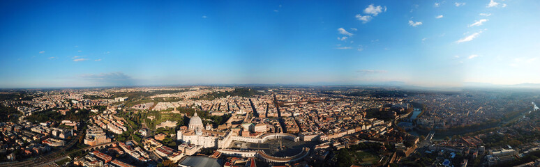 Fototapeta na wymiar Aerial drone view of Saint Peter's square in front of world's largest church - Papal Basilica of St. Peter's, Vatican - an elliptical esplanade created in the mid seventeenth century, Rome, Italy