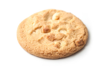 closeup of white chocolate cookie pile on white background