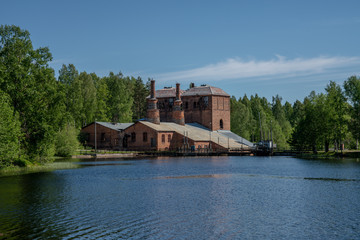 Fototapeta na wymiar Old brick industry building of a closed down steel mill in Sweden