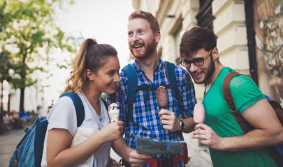 Happy group of tourists traveling and sightseeing