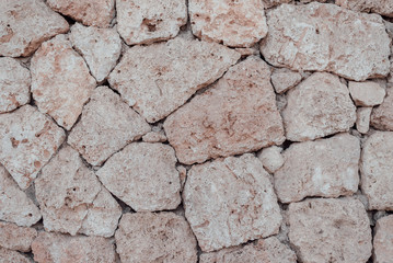 Beige stone vintage wall background. Old wall texture.