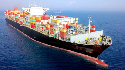 Container ship at sea - Aerial image of a ULCV (Ultra large container vessel) loaded with various...
