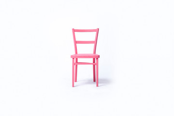 Pink chair on a white background