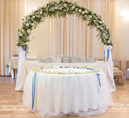 Wedding cake table with flowers decoration