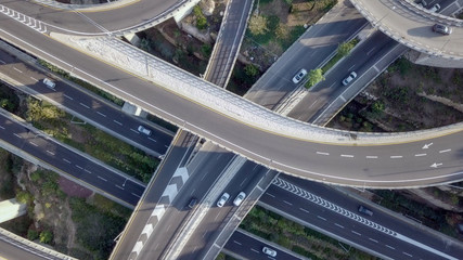 Multi level Highway interchange with traffic on all levels - Aerial image