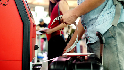 Close up of check-in at self help desk in the airport