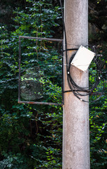 Big spider web on a street pillar