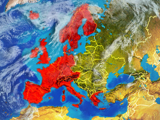 Fototapeta na wymiar Western Europe from space on model of planet Earth with country borders. Extremely fine detail of planet surface and clouds.