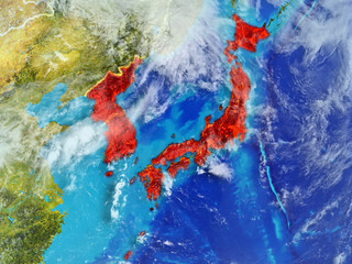 Japan and Korea from space on model of planet Earth with country borders. Extremely fine detail of planet surface and clouds.