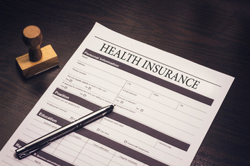 health insurance form, paperwork and questionnaire for insurance concepts