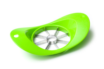 closeup of green apple cutter on white background