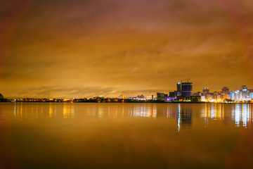 Naklejka premium Minsk at night in reflection